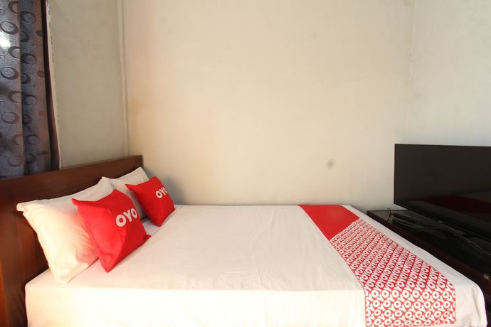 Imagen de la habitación del Hotel OYO 93267 Barokah Rooms Syariah. Foto 4