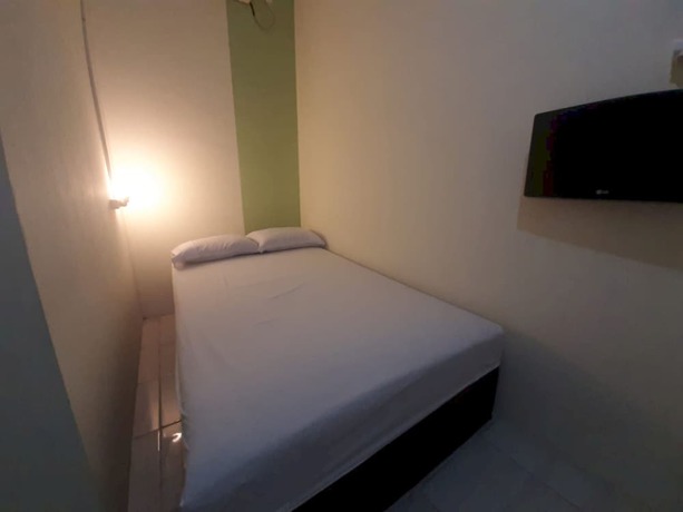 Imagen de la habitación del Hotel OYO 93274 Oren Home Bekasi. Foto 4