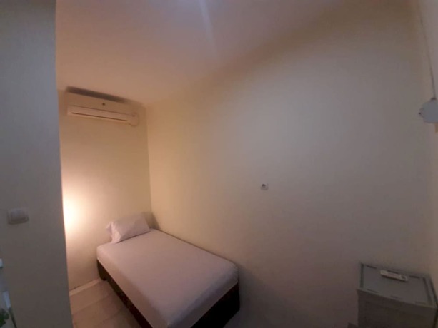 Imagen de la habitación del Hotel OYO 93274 Oren Home Bekasi. Foto 6