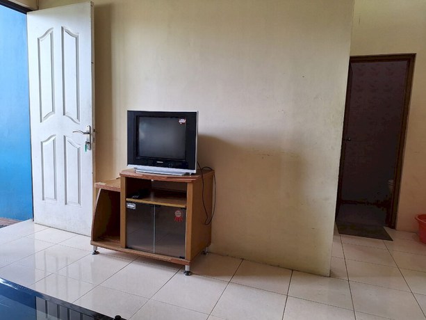 Imagen de la habitación del Hotel OYO 93280 Villa Efita. Foto 4