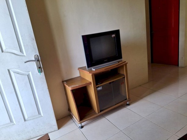 Imagen de la habitación del Hotel OYO 93280 Villa Efita. Foto 5