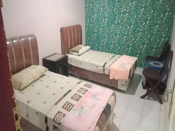 Imagen de la habitación del Hotel OYO 93292 Raudhatul Husna Homestay Syariah. Foto 13
