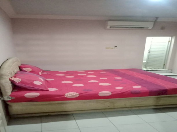 Imagen de la habitación del Hotel OYO 93292 Raudhatul Husna Homestay Syariah. Foto 15