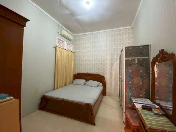 Imagen de la habitación del Hotel OYO 93292 Raudhatul Husna Homestay Syariah. Foto 17