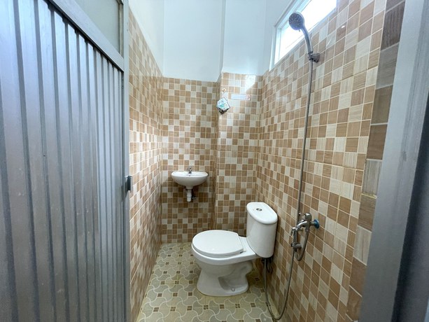 Imagen de la habitación del Hotel OYO 93297 Penginapan Musafir Syariah. Foto 2