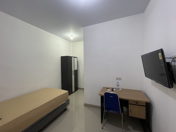 Imagen de la habitación del Hotel OYO 93297 Penginapan Musafir Syariah. Foto 3