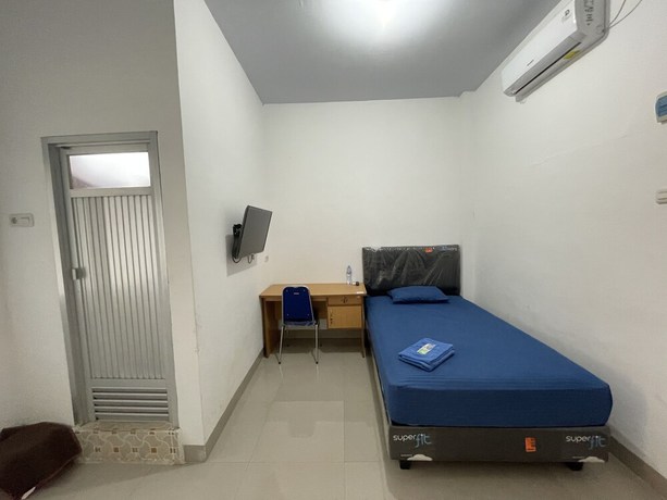 Imagen de la habitación del Hotel OYO 93297 Penginapan Musafir Syariah. Foto 5