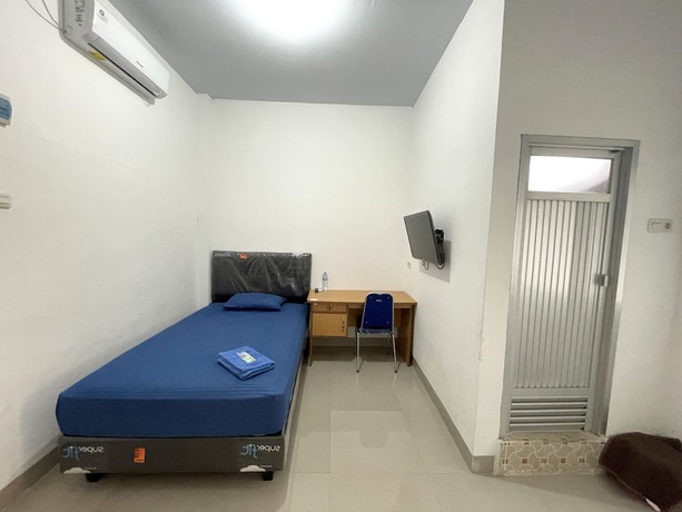 Imagen de la habitación del Hotel OYO 93297 Penginapan Musafir Syariah. Foto 6