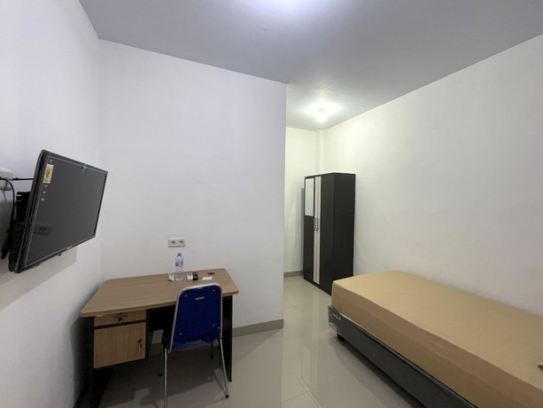Imagen de la habitación del Hotel OYO 93297 Penginapan Musafir Syariah. Foto 7