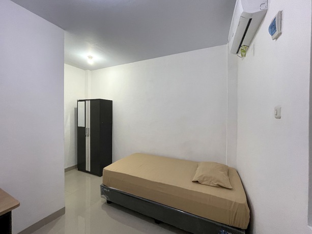 Imagen de la habitación del Hotel OYO 93297 Penginapan Musafir Syariah. Foto 8