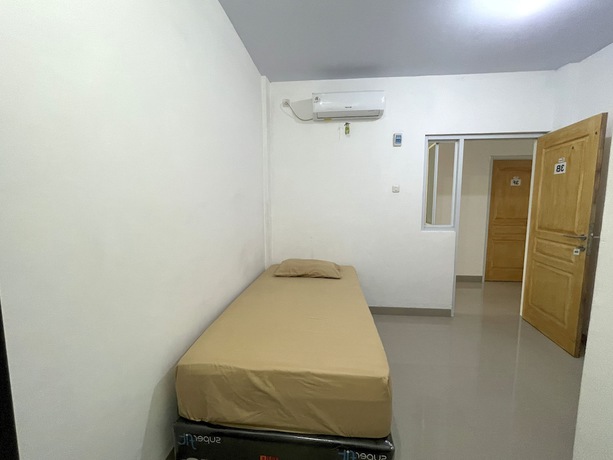 Imagen de la habitación del Hotel OYO 93297 Penginapan Musafir Syariah. Foto 9