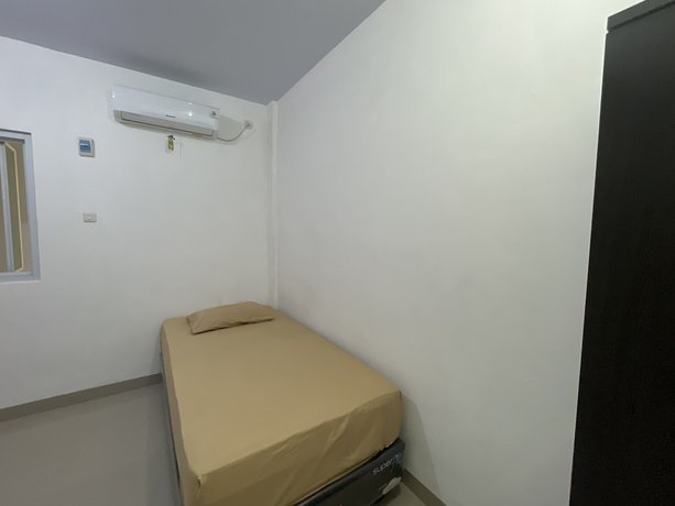 Imagen de la habitación del Hotel OYO 93297 Penginapan Musafir Syariah. Foto 10