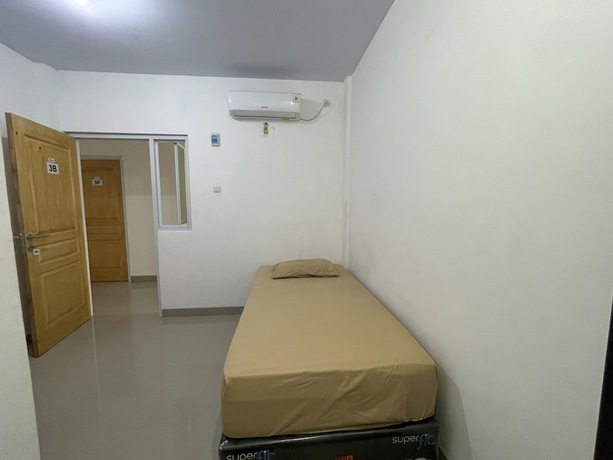 Imagen de la habitación del Hotel OYO 93297 Penginapan Musafir Syariah. Foto 11