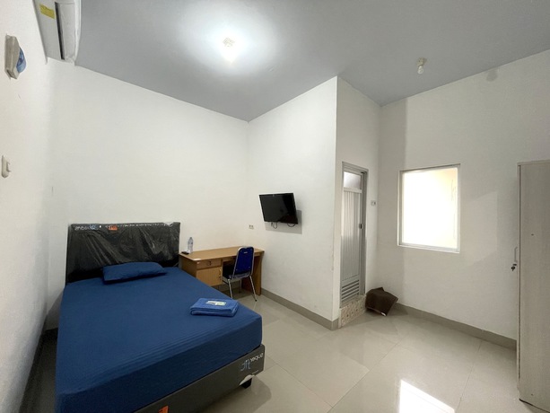 Imagen de la habitación del Hotel OYO 93297 Penginapan Musafir Syariah. Foto 12