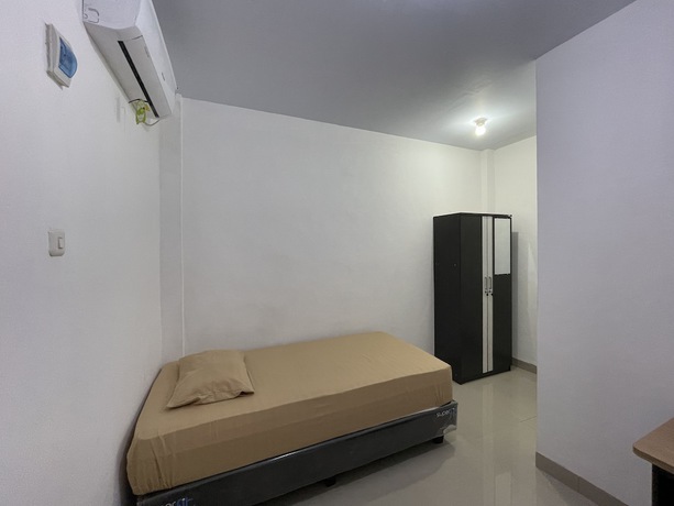 Imagen de la habitación del Hotel OYO 93297 Penginapan Musafir Syariah. Foto 13
