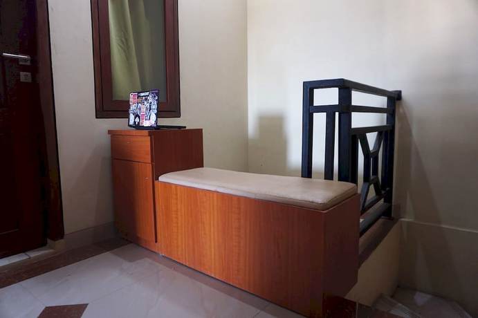 Imagen de los interiores del Hotel OYO 93306 Kos Citra Syariah. Foto 10