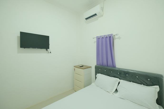 Imagen de la habitación del Hotel OYO 93306 Penginapan Permata Hijau Syariah. Foto 5