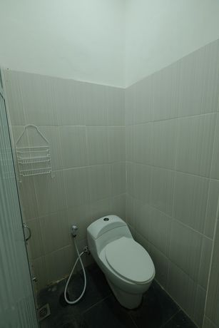 Imagen de la habitación del Hotel OYO 93306 Penginapan Permata Hijau Syariah. Foto 8