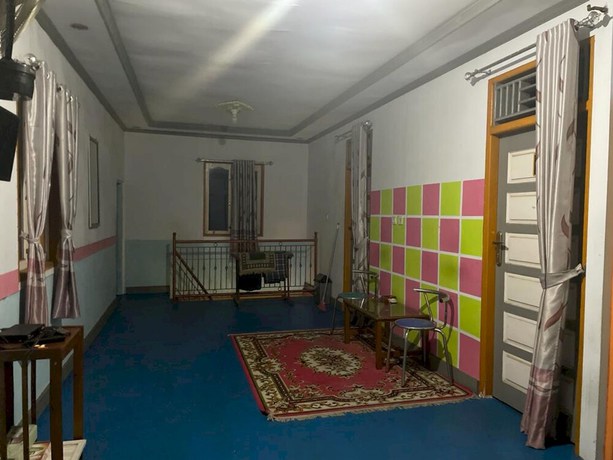Imagen de los interiores del Hotel OYO 93308 Lima Saudara Syariah. Foto 19