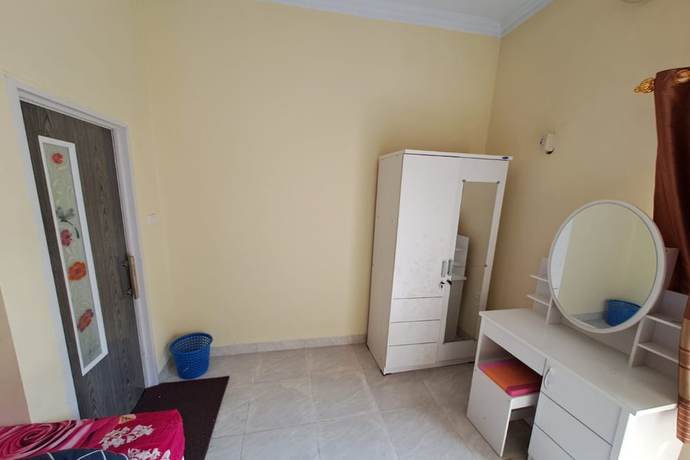 Imagen de la habitación del Hotel OYO 93320 Venus Homestay Syariah. Foto 10