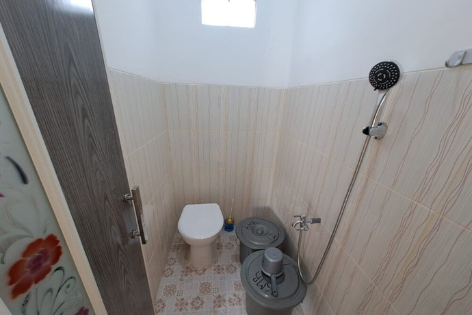 Imagen de la habitación del Hotel OYO 93320 Venus Homestay Syariah. Foto 11