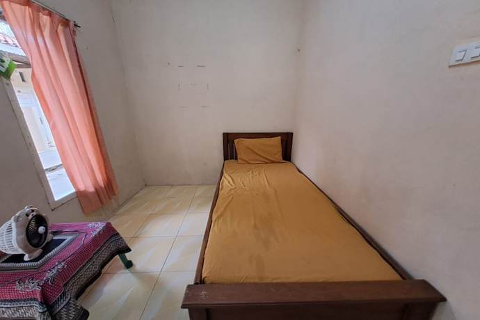 Imagen de la habitación del Hotel OYO 93320 Venus Homestay Syariah. Foto 12