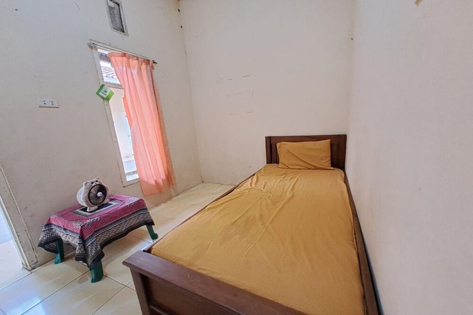 Imagen de la habitación del Hotel OYO 93320 Venus Homestay Syariah. Foto 13