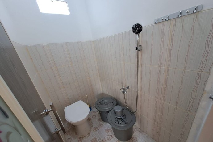 Imagen de la habitación del Hotel OYO 93320 Venus Homestay Syariah. Foto 14