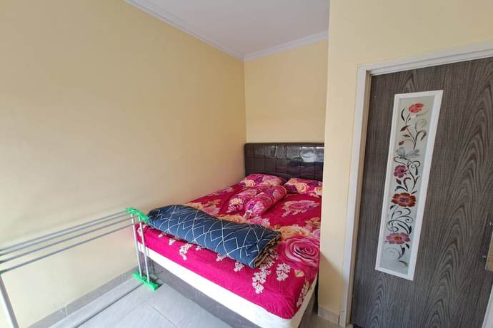 Imagen de la habitación del Hotel OYO 93320 Venus Homestay Syariah. Foto 16