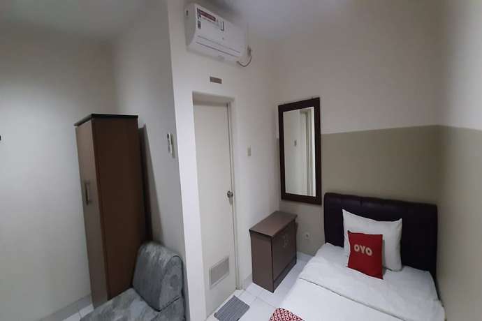 Imagen de la habitación del Hotel OYO 93358 Sukamulya Homestay. Foto 2