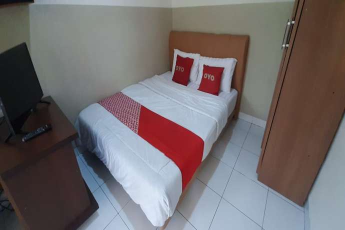 Imagen de la habitación del Hotel OYO 93358 Sukamulya Homestay. Foto 5