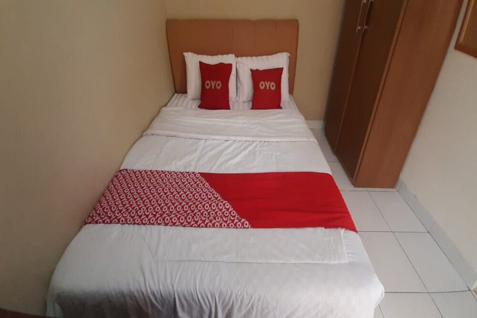 Imagen de la habitación del Hotel OYO 93358 Sukamulya Homestay. Foto 6