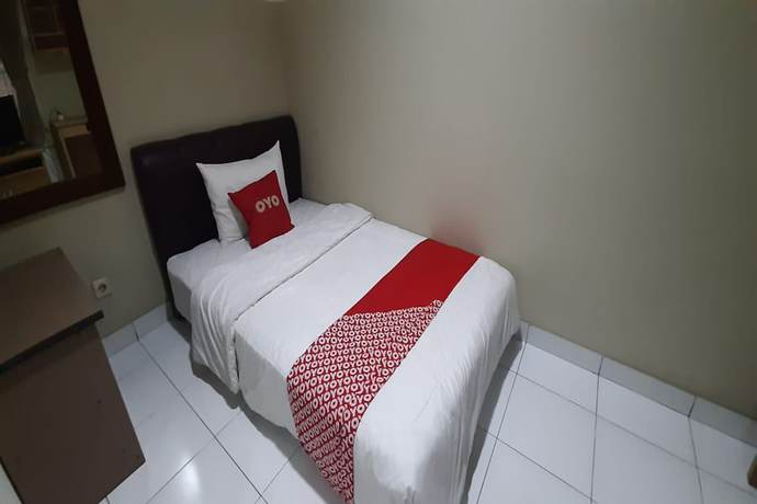Imagen de la habitación del Hotel OYO 93358 Sukamulya Homestay. Foto 16