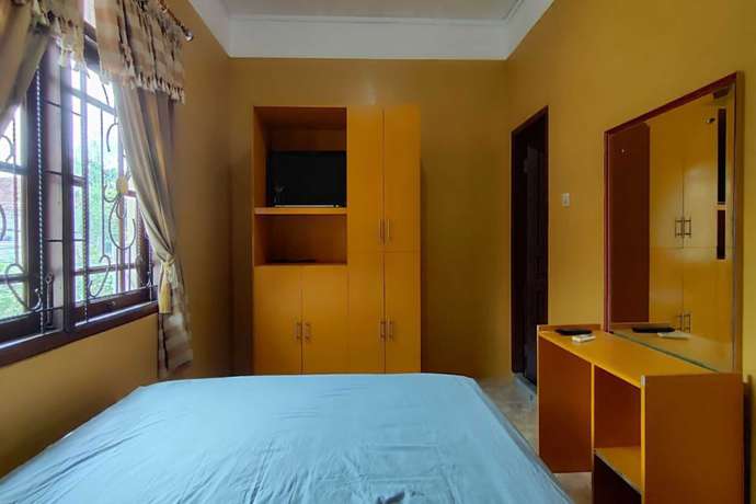 Imagen de la habitación del Hotel OYO 93390 Griya Pius Syariah Malioboro. Foto 5