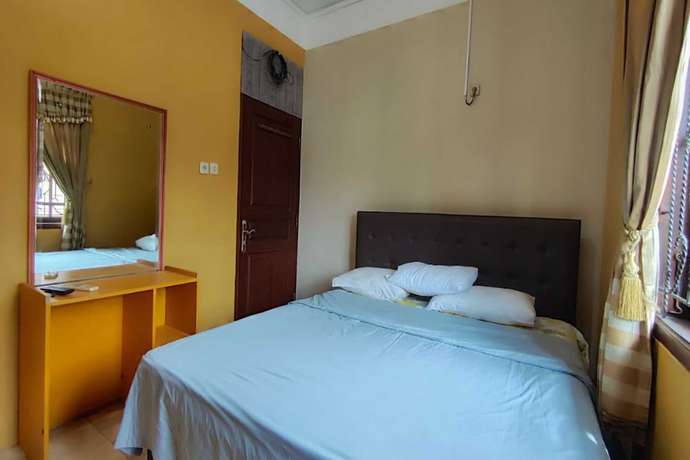 Imagen de la habitación del Hotel OYO 93390 Griya Pius Syariah Malioboro. Foto 8