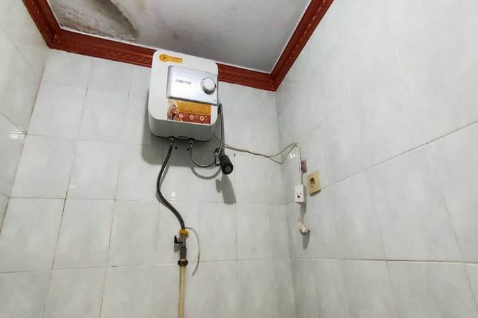 Imagen de la habitación del Hotel OYO 93390 Griya Pius Syariah Malioboro. Foto 9