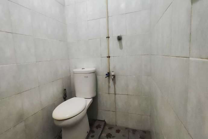 Imagen de la habitación del Hotel OYO 93390 Griya Pius Syariah Malioboro. Foto 11