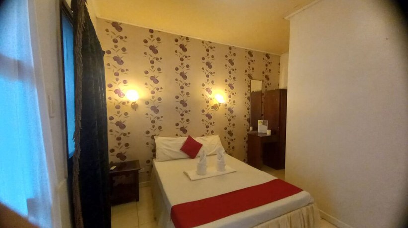 Imagen de la habitación del Hotel OYO 934 Bea\'s Garden Inn. Foto 7