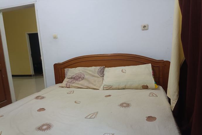 Imagen de la habitación del Hotel OYO 93408 Penginapan Annisya. Foto 7