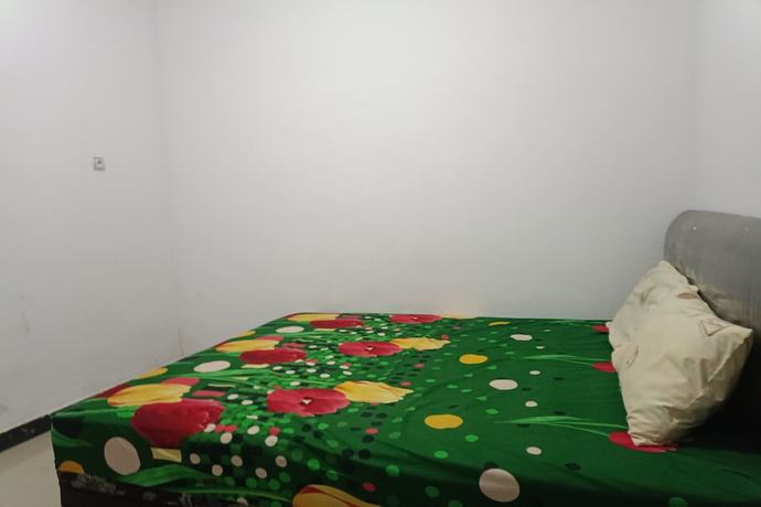 Imagen de la habitación del Hotel OYO 93408 Penginapan Annisya. Foto 10