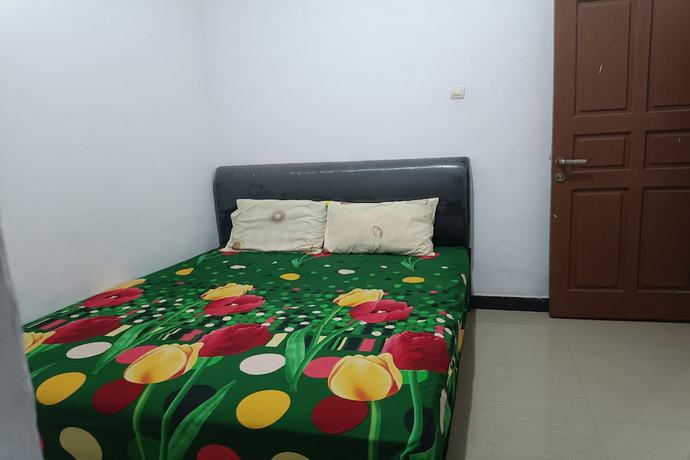 Imagen de la habitación del Hotel OYO 93408 Penginapan Annisya. Foto 13