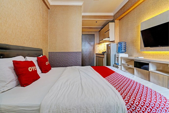 Imagen de la habitación del Hotel OYO 93426 Metro Suites By Goodvibes. Foto 2