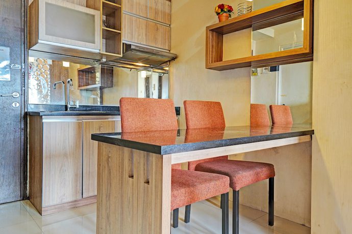 Imagen de la habitación del Hotel OYO 93426 Metro Suites By Goodvibes. Foto 3