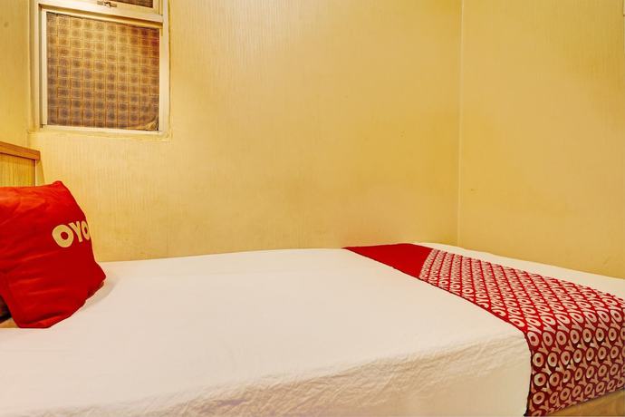 Imagen de la habitación del Hotel OYO 93426 Metro Suites By Goodvibes. Foto 4