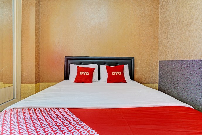 Imagen de la habitación del Hotel OYO 93426 Metro Suites By Goodvibes. Foto 5
