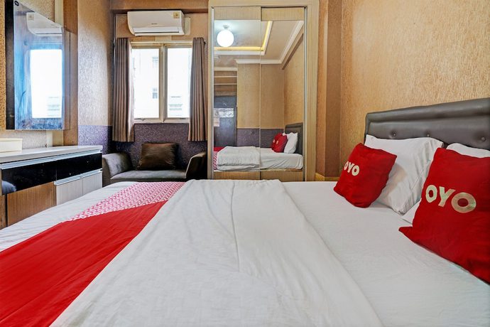 Imagen de la habitación del Hotel OYO 93426 Metro Suites By Goodvibes. Foto 6