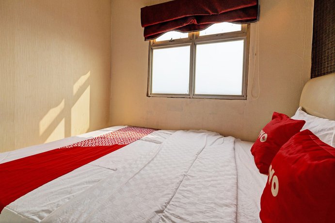 Imagen de la habitación del Hotel OYO 93426 Metro Suites By Goodvibes. Foto 8