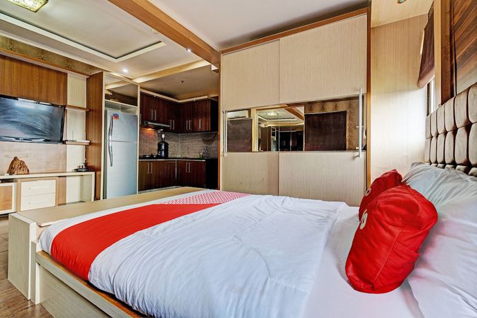 Imagen de la habitación del Hotel OYO 93426 Metro Suites By Goodvibes. Foto 11