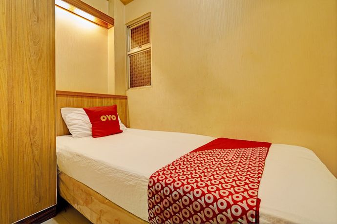 Imagen de la habitación del Hotel OYO 93426 Metro Suites By Goodvibes. Foto 13