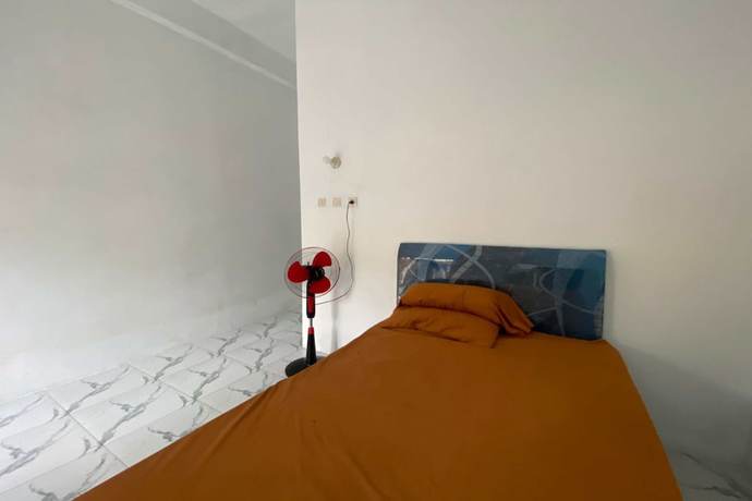 Imagen de la habitación del Hotel OYO 93440 Warde Hotel Near Sae Restaurant. Foto 13